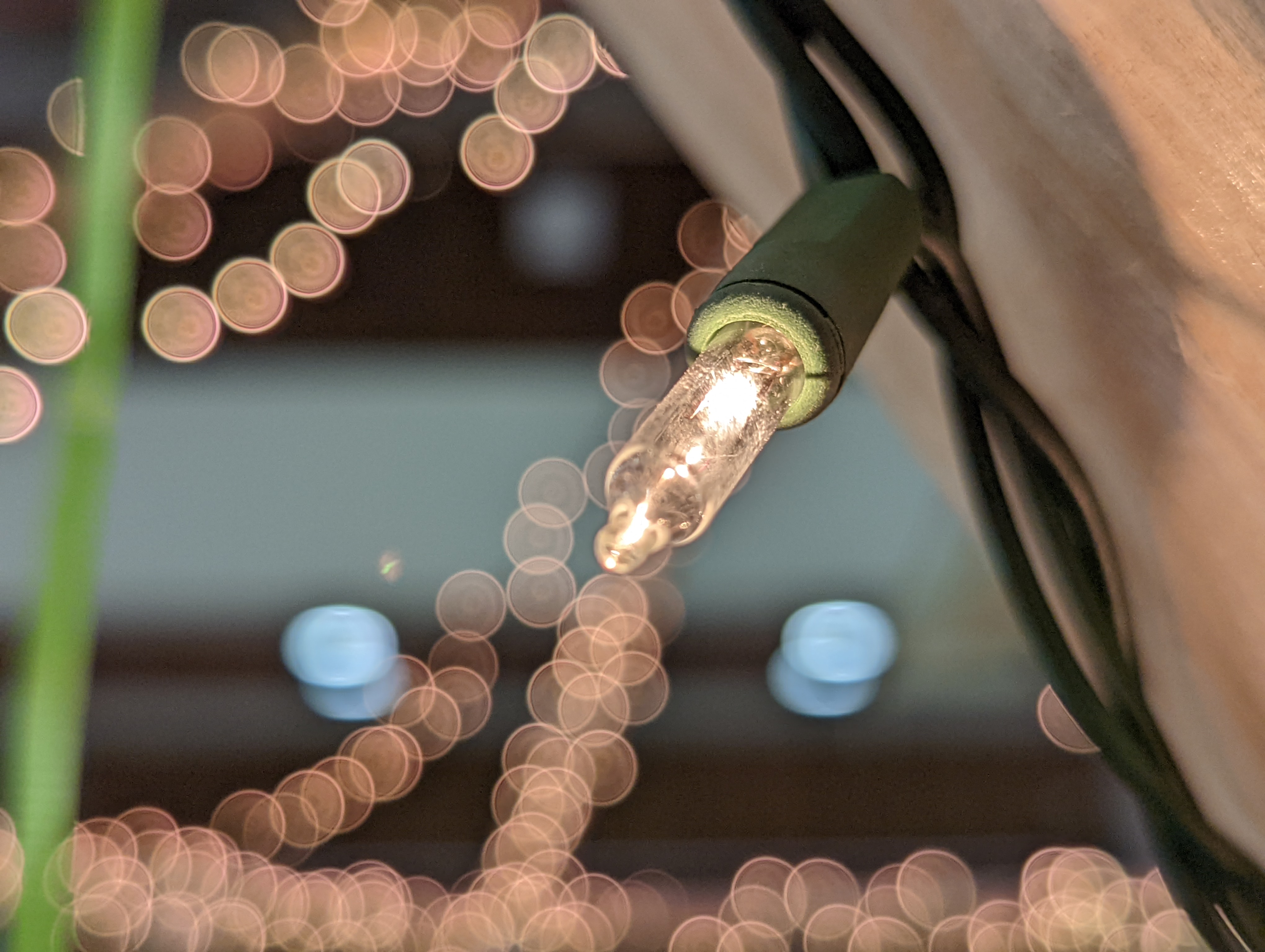 A photograph of a light bulb illuminating the space.